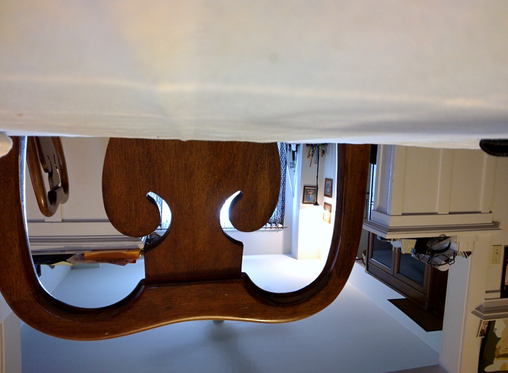 Upside-down photo of chair and ceiling